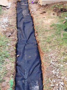 French Drain Wrapped in Geotextile Fabric