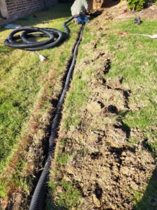 Landscaping Company Installing Yard Drainage System
