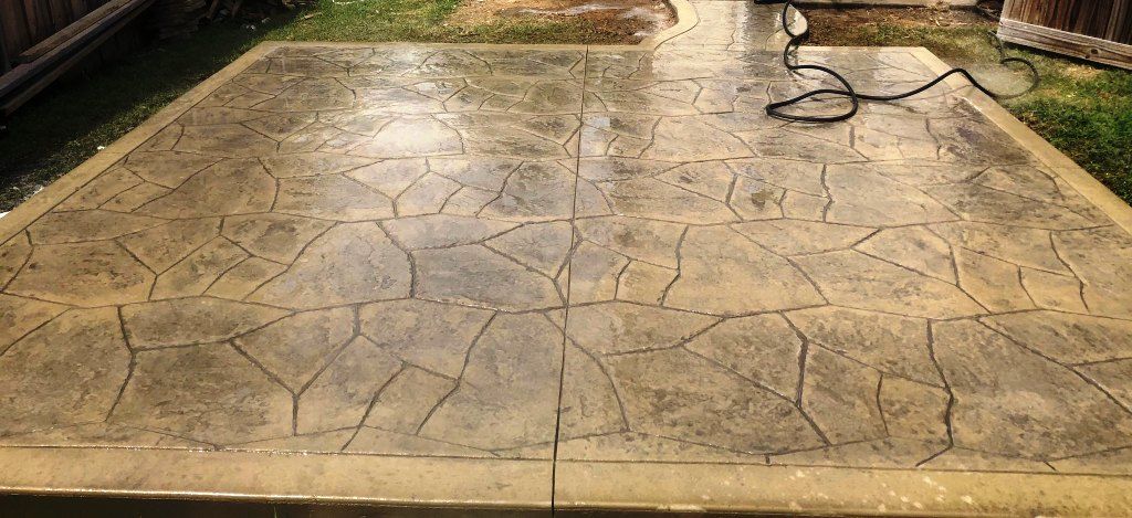 What Is Stamped Concrete Decorative Or Pavers Better - Stamped Concrete Patio Flagstone Look